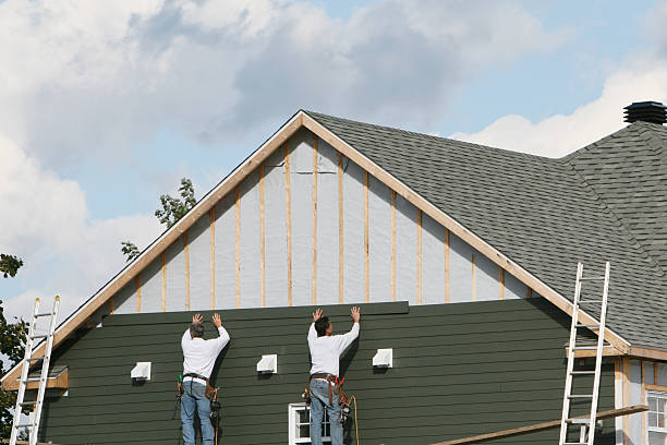 Professional Siding Replacement technician working in Mingo Junction, OH